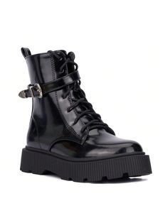 Make a bold statement with our Little Dipper girls combat boots in faux patent leather! These boots exude confidence with their sleek design and edgy buckle strap detail. Crafted for both style and durability, they're perfect for any adventurous young fashionista. Whether she's stomping through the playground or strutting her stuff at a party, these boots will add a touch of attitude to her outfit.• Upper: 100% Faux Leather• Outsole: 100% Thermoplastic Rubber (TPR)• Lining: 80% Polyester, 20% Fa Punk Style Combat Boots For Outdoor, Trendy Outdoor Platform Boots, Trendy Faux Leather Martin Boots, Trendy Platform Boots With Buckle, Trendy Platform Boots With Buckle Closure, Edgy Combat Boots With Buckle For Streetwear, Edgy Combat Boots With Buckle Closure For Streetwear, Edgy Combat Boots For Streetwear With Buckle Closure, Edgy Streetwear Combat Boots With Buckle Closure