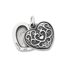 Tuck a treasured photo in this sterling silver locket accented with graceful scrolling details. The front gently swivels open to reveal what you carry inside the heart. Engrave the back of the locket with special messages, dates, names or initials. Engraved Open Heart Locket Necklace, Antique Silver Heart Charm Jewelry For Anniversary, Antique Silver Engraved Locket Necklace For Anniversary, Engraved Antique Silver Locket Necklace For Anniversary, Engraved Sterling Silver Locket Necklace For Mother's Day, Sterling Silver Open Heart Locket Necklace, Silver Sterling Silver Locket Necklace With Charms, Sterling Silver Heart Charm Locket For Anniversary, Silver Double Heart Locket Necklace For Memorial