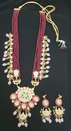 Long Kundan necklace set with earrings/Ruby pink long rani haar/Indian Jewelry/Pakistani Jewelry/ Pakistani Necklace * This Jewelry set would add more charm to your beautiful jewelry collection and would surely bring lots of compliments . * Note:- This is an artificial Jewelry Set. * Care Instructions:  Please store the jewelery safely in airtight packaging, away from moisture, water, perfume and chemicals and clean with a soft, dry cloth for long life. **Please note: Returns won't be accepted f Pink Traditional Necklace With Stone Work, Traditional Pink Necklace With Stone Work, Traditional Pink Stone Work Necklaces, Traditional Pink Necklaces For Festivals, Pink Tilla Necklace For Diwali, Pink Meenakari Necklaces For Festivals, Pink Meenakari Necklace For Festivals, Pink Tilla Necklaces For Diwali, Pink Necklaces With Tilla For Diwali