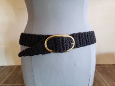 "Vintage 1960's to 1970's Belt Black Crocheted Wool Type Yarn Large Oval Gold Tone Buckle  4\" X 2\" 35.5\"  Total Length 2\"  Wide Adjustable Through the Yarn  (suggest 32\" Maximum Wearable Length) Remember you need to fit within the measurements given for the best fit, keeping into consideration decade/style and fit of a vintage garment.   Measure a similar item in your closet as reference.    Clothing Items are measured across seam to seam and doubled for your convenience where necessary.    Bodice Measurements are  35 Bust and 26 waist Review All Photos Carefully as they are a part of the description Very Nice Condition - There are a couple areas where color has bled onto top near embroidery.  I did not try to remove. Still an Awesome Authentic Crop Top. Ships Promptly and with care. Crochet Belt, Crochet Wool, How Many People, Black Crochet, Suspender Belt, Black Belt, Suspenders, Crochet Accessories, Vintage Black