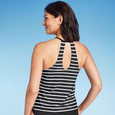 Feel fabulous and look stylish during sunny outings in this Striped High-Neck Tankini Top from Kona Sol™. Made from stretchy fabric for flexible comfort, this tankini top is fashioned in a striped pattern with a high-neck design and racerback for chic style. You’ll love the stretchy fabric that lends flexible movement in and out of the water, while sewn-in cups provides comfortable coverage. Complete your look with a swim bottom, a pair of sunnies and flip-flops. Kona Sol™: Made for your day in Triangle Top With Built-in Bra For Pool, Beach Tops With Built-in Bra, Seamless Halter Neck Summer Top, Beach Elastane Tank Top, Beach Tops With Built-in Bra And Stretch, Stretch Halter Neck Tops For Beach Season, Upf 50+ Beachwear Tops For Swimming, Beach Top With Built-in Bra, Poolside Tankini With Built-in Bra