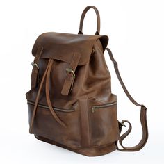 Robel Backpack: Dark Brown - SKADMAS Casual Laptop Backpack For Trips, Large Capacity Laptop Backpack For Travel, Casual Backpack With Adjustable Strap For Trips, Large Capacity Backpack Laptop Bag For Trips, Functional Large Capacity Leather Backpack For Travel, Large Capacity Laptop Backpack For Trips, Functional Satchel Leather Backpack For Travel, Functional Leather Satchel Backpack For Travel, Brown Large Capacity Backpack For Travel