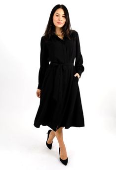 Chic A-line Midi Dress For Business, Formal Midi Dress With Pockets, Formal Fall Shirt Dress With Belted Cuffs, Formal Shirt Dress With Belted Cuffs For Fall, Elegant Workwear Dresses With Pockets, Elegant Work Dresses With Pockets, Elegant Dresses With Pockets For Work, Elegant Long Sleeve Midi Dress With Belted Cuffs, Classic Belted Shirt Dress For Semi-formal Occasions