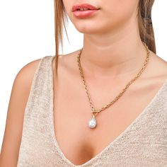 This Sterling Silver Gold Plated Necklace for Women from our Tender Collection is a timelessly elegant accessory crafted to perfection. Adorned with a 14mm Baroque White Pearl, this classic piece is sure to make a statement. The 18.8" length perfectly accentuates the organic pearl, creating a look that is as timeless as it is graceful. Pearl White Chain Necklace For Formal Occasion, Formal Pearl Pendant Chain Necklace, Elegant Pearl Drop Chain Necklace For Formal Occasions, Timeless Baroque Pearl Jewelry As Gift, Luxury Baroque Pearl Charm Jewelry, Timeless Baroque Pearl Jewelry For Formal Occasions, Elegant Yellow Gold Baroque Pearl Jewelry, Elegant Yellow Gold Baroque Pearl Necklace, Elegant Yellow Gold Necklace With Baroque Pearl