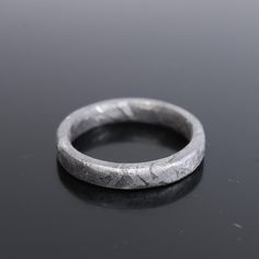 Material: Iron meteorite (mainly iron and nickel) Shape: Circular Purpose: Ring Ring size:6.75(US) Inner diameter: 17.2mm Width: 3mm Thickness: 2mm Please note that this product has some defects, please look at the photos and videos carefully, thank you for your cooperation! Meteorite Ring Men, Metorite Mens Wedding Ring, Luxury Brutalist Men's Ring With Oxidized Finish, Men’s Meteorite Ring, Meteorite Necklace, Iron Meteorite, Meteorite Ring, Ring Ring, Beauty Book