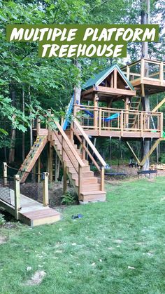 a treehouse built in the woods with stairs leading up to it and a slide