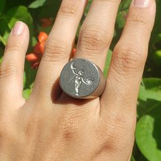 This signet ring is cast in lead-free pewter. The ring size when cast is 7.25. The sealing image is the sun and moon orbiting a figure.       This is part of a series of signet rings I am making cast from lead-free pewter. Each master ring is hand sculpted to give a unique, rustic style, multi-dimensional relief image when used as a stamp to seal, with sealing wax. Symbolic Round Hand Cast Signet Ring, Moon Orbit, Moon Circle, The Sun And Moon, Signet Rings, Sealing Wax, Circle Ring, Sun And Moon, Wax Seal