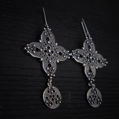 Dear costumer, please notice the time of delivery can change due to weather, situation in the destination country, and due to other reasons. Long dangling earrings made of sterling silver (925). Cross shaped earrings with round pendant. They look truly gorgeous with every outfit! Approx. weight - 15.6 gr. This jewelry you will receive in a gift box, so you can give it to your loved one right away. 3-5 business days order processing time Free shipping includes standard 10-15 business days deliver Nickel Free Silver Danglers, Handmade Silver Dangle Earrings, Silver Long Drop Earrings With Oxidized Finish, Handmade Silver Artisan Earrings, Silver Oxidized Long Drop Jewelry, Silver Long Drop Jewelry With Oxidized Finish, Handmade Artisan Silver Earrings, Oxidized Silver Long Drop Jewelry, Sterling Silver Chandelier Earrings As Gift