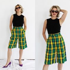 "Such a fun and soft pair of longline electric yellow, green and purple plaid shorts. KAPOW.  By Bianca. Tagged Sz. 6, made in Canada. Viscose/rayon. Zipper fly.  Measures:  Waist: 27\" Hips: 40\" Front rise: 14\" Length: 25\" Condition: excellent.  FOLLOW US ON INSTAGRAM FOR DEALS AND SNEAK PEEKS! @Wildthingvintage instagram.com/wildthingvintage Twitter: @Wildthingpeck Message me any time for further details or questions. Please note there is a 10% restocking fee on orders cancelled prior to shipment. Returns are upon a case by case basis, and only if the item is not as described. I will happily expedite or overnight shipping at cost upon request. Standard shipping to the US and Canada is 2 weeks. Interested in more than one treasure? Message me for a discount on multiple orders! Live in Summer Plaid Wide Leg Bottoms, Summer Plaid Wide-leg Bottoms, Summer Wide Leg Plaid Bottoms, Fitted Summer Bottoms Knee-length, Green Knee-length Bottoms For Day Out, Knee-length Green Bottoms For Day Out, Plaid Summer Bottoms Short Length, Plaid Short Bottoms For Summer, Fitted Plaid Casual Shorts