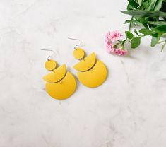 bright yellow stacked half moon and moon shape leather earrings Chic Yellow Earrings For Gift, Modern Yellow Earrings For Everyday, Modern Yellow Earrings For Everyday Wear, Chic Yellow Earrings For Spring, Chic Yellow Earrings For Summer, Trendy Yellow Earrings For Everyday, Trendy Yellow Everyday Earrings, Brass Hooks, Muslin Bags