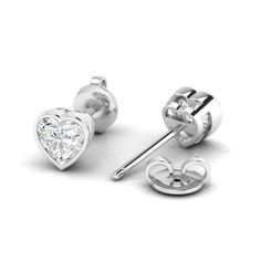 Our new heart bezel set oval diamond studs are hand fabricated for everyday and evening wear. These also come in ruby, blue sapphire, pink sapphire with halo diamonds. 14K & 18K yellow, gold, or white gold Total Heart Diamond Weight: .5 cts, 1 cts, 2 cts Grams Gold: .83 gms, 1.56 gms, 2,48 gms Bezel set heart diamond studs D-E-F colore, VVS/VS clarity﻿ Made in Los Angeles and New York Complimentary gift wrapping provided Bezel Set Earrings, Signature Bracelet, Diamond Stacks, Nature Inspired Rings, Trending Engagement Rings, Bridal Diamond Jewellery, Ring Trends, New Heart, Heart Diamond