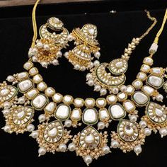 Gold Rodium Polish White and Off White color Necklace in Metal Alloy studded with CZ Diamond, Kundan, Pearl Maroon Necklace, Engagement Reception, Color Necklace, Metal Necklace, White Necklace, Waist Chain, Blue Necklace, Off White Color, Cz Diamond