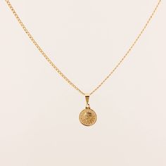 D E T A I L S • Single Coin Necklace• 18k Gold Filled• Chain Length: 18" with 1" extender• Small Coin Size: 12mm x 15mm• Medium Coin Size: 15mm x 18mm M A T E R I A L S •Our Gold filled jewelry has an outer layer of 14k or 18k gold that is pressure bonded to a base metal of jewelers brass. •This type of jewelry is made for everyday use of stacking or layering. • This type of jewelry can withstand normal body sweat, body oils, and is typically water resistant. J E W E L R Y C A R E Take extra car 14k Gold-filled Yellow Gold Charm Necklace With Coin Pendant, 14k Gold-filled Yellow Gold Coin Pendant Charm Necklace, 14k Yellow Gold Filled Charm Necklace With Coin Pendant, Classic Charm Necklaces With Coin Pendant, Classic Yellow Gold Charm Necklace With Coin Pendant, Classic Gold-plated Coin Necklace With Round Pendant, Classic Gold Plated Coin Necklace With Round Pendant, Everyday Yellow Gold Coin Necklace, Classic Gold-plated Coin Necklace