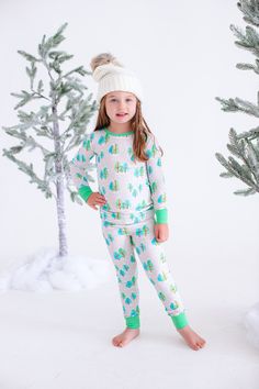 These pajamas are a perfect combination of comfort and style! Crafted from a blend of bamboo viscose and spandex fabric, they provide a soft and snug fit, while their adorable prints are sure to make them a sleepwear favorite. The breathable fabric keeps little ones comfy all night long. MATERIAL/FEATURES: -95% viscose from bamboo, 5% spandex -made from bamboo viscose not treated with any harsh chemicals -tagless for added comfort -buttery soft and great for sensitive skin **Colors may vary slig Playful Sleepwear For Loungewear, Playful Stretch Sleepwear For Loungewear, Playful Fitted Loungewear Sets, Green Matching Sleepwear For Loungewear, Matching Green Sleepwear For Loungewear, Green Matching Lounge Sleepwear, Winter Matching Sleepwear For Loungewear, Matching Winter Sleepwear For Loungewear, Green Matching Sleepwear