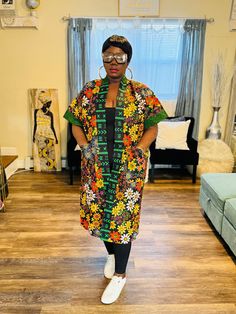 This beautiful African print kimono with unique color. This gorgeous piece will go with any outfit in your closet. African Print Kimono Jackets, Multicolor Print Kimono With Vibrant Print And Kimono Sleeves, Multicolor Printed Short Sleeve Kimono, Multicolor Wrap Kimono For Fall, Multicolor Kaftan With Kimono Sleeves For Fall, Traditional Open Front Kimono For Spring, Multicolor Fall Kaftan With Kimono Sleeves, Traditional Spring Open Front Kimono, Traditional Open Front Spring Kimono