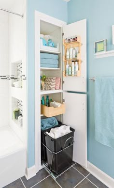 the bathroom is clean and ready to be used as a storage area for towels, toiletries and other items