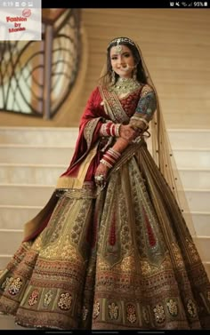 a woman in a bridal gown posing for the camera