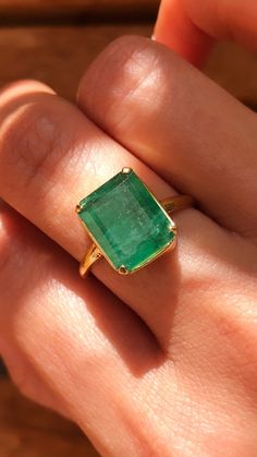 "\"Large Natural Colombian Emerald Solitaire Ring \" ◆ Approximate Emerald-Cut Emerald Size: 11mm x 9.5mm ◆ Approximate Emerald Carat Weight: 4.30Ct - 4.65Carat ◆ Material: 14k or 18k Solid Yellow Gold ◆ Setting: One gallery style with 4 prongs setting ------------ ◆ APPRAISAL CERTIFICATE If you like to get an appraisal certificate for your ring please make your request through this listing below: You can add this to your card while you are placing your order, so your ring will come with the cer Green Emerald Solitaire Ring, Emerald Engagement Ring Thick Band, Emerald And Gold Ring, Vintage Emerald Rings, Panna Ring, Emerald Cut Emerald Ring, Jade Engagement Ring, Emerald Statement Ring, Emerald Gold Ring