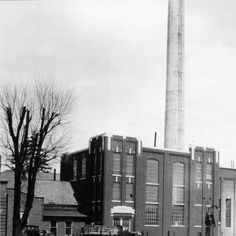 black and white photograph of an old factory