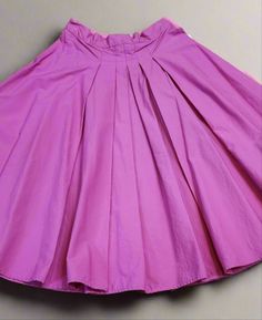 This pretty in pink skirt is made of 100% Cotton and has lovely pleated detailing in the front. It measures a 27" waist and 25.5" in length, hitting just below the knee. Handmade personally by Hollyville shop owner, Pam Pink Pleated A-line Skirt, Elegant Pink Pleated Skirt, Pink A-line Pleated Skirt, Pink Accordion Pleats Skirt, Elegant Pink A-line Pleated Skirt, Spring Full Skirt With Accordion Pleats, Spring Full Accordion Pleated Skirt, Pink Flowy Pleated Skirt, Flowy Pink Pleated Skirt