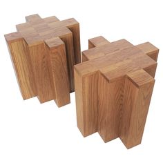 three pieces of wood sitting next to each other