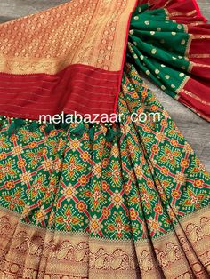 *Fine Silk Patola Saree! *Glamorous saree in green with patola weaving all throughout and Banarsi border *Matching blouse fabric included *Fall attached and designer tassels on the palla Note: The color of the products may slightly vary according to the ambient lighting conditions and the color calibration of LED devices. If you would like more clarity before your purchase, please drop us a message . Transitional Green Art Silk Sharara, Transitional Green Pre-draped Saree With Self Design, Green Art Silk Sharara With Cutdana, Festive Green Paithani Silk Pre-draped Saree, Festive Green Pre-draped Saree With Zari Weaving, Festive Green Pre-draped Saree With Pallu, Festive Green Pre-draped Saree With Self Design, Traditional Green Semi-stitched Sharara, Green Semi-stitched Saree