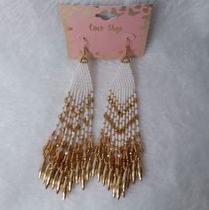 Multi-Dangle Pierce Earrings In Gold And White Beads By Coco Skye. The Back Of Card States Made In India, The Card May Be Made In China. New Without Tags. Did Not Removed From Card For Pictures. Measurements 5 Inches At Longest Point By 1 1/2 Inches At Widest Without The Dangle. Measurements Done Laying Down Are Estimated. # Ak- 5 Earrings In Gold, Beaded Dangles, White Beads, Earings Piercings, Earrings Gold, Seed Bead, Beaded Earrings, Made In China, Seed Beads