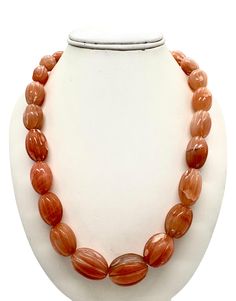 100 % Natural Orange Aventurine hand carved nugget shape beaded necklace with funda. Details: - Gemstone: Orange Aventurine Calibration of beads: From 12X17millimeters till 25X30millimeters approx Strand: 1 Gross Weight Of Necklace: 799.00 Carats Net Weight Of Stones:  793.00 Carats Length Of Necklace: 18.50 Inches  SKU: FUNDA042 100% NATURAL ORANGE AVENTURINE PERFECT POLISHING VERY OLD MINES BEADS NECKLACE FOR WOMEN AND GIRLS WEAR AMAZING QUALITY PRODUCT NOT HEATED NOT TREATED NOT DYED ATTRACTIVE NECKLACE UNIQUE NECKLACE Thank you for your kind visit to my shop. NOTE: - You will receive the same product you see in the picture.   Dear Buyers, please feel free to ask questions    We will be glad to answer & solve query regarding this product RETURN POLICY: -   Every piece of jewelry and inp Luxury Amber Necklace For Formal Occasions, Formal Orange Single Strand Necklace, Formal Carved Round Necklace, Formal Round Carved Necklace, Orange Oval Carnelian Necklaces, Oval Necklace With Natural Stones For Formal Occasions, Formal Oval Necklace With Polished Beads, Amber Gemstone Bead Necklaces For Formal Occasions, Amber Gemstone Beads Necklace For Formal Occasions