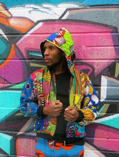 "Festival Jacket, African Print Jacket, Hippie Jacket COLOUR ME CRAZY HOODIE - These crazy colourful patchwork jackets are made from 100% recycled fabrics.  A real rainbow jacket that will mean you never get lost in a festival field and will turn heads on the city streets!   - African print jacket/ hoodie - Unisex design - Made from 100% recycled patchwork fabric - Lined for additional warmth - Black stretchy cuffs and waist for comfy fit - Big pockets - Matching COLOUR ME CRAZY hats, trousers a Cotton Patchwork Windbreaker For Streetwear, Streetwear Cotton Hooded Jacket With Patchwork, Cotton Patchwork Hooded Jacket For Streetwear, Multicolor Hooded Jacket For Streetwear, Multicolor Streetwear Hoodie, Multicolor Hooded Jacket With Drawstring For Streetwear, Urban Multicolor Hooded Hoodie, Urban Multicolor Hoodie For Winter, Urban Multicolor Winter Hoodie