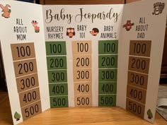 two baby shower game boards with animals on them