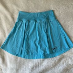 Never Worn Built In Shorts W/ Ball Pocket Color: Baltic Blue High Rise Blue Swim Skirt With Built-in Shorts, Blue Sports Skort With Elastic Waistband, Blue Stretch Tennis Skirt With Elastic Waistband, Blue Casual Short Swim Skirt, Casual Blue Short Swim Skirt, Blue Short Casual Swim Skirt, Blue Sports Skort With Pockets, Stretch Blue Tennis Skirt With Pockets, Blue Stretch Tennis Skirt With Pockets