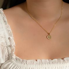 Radiate in our Sun necklace. - Waterproof, tarnish resistant & hypoallergenic- Made in gold vermeil: a thick 18k gold layer on sterling silver.- Adjustable chain 17 to 18 in.- Pendant size: 12.5 mm Everyday Gold Plated Tarnish Resistant Medallion Necklace, Everyday Gold-plated Tarnish Resistant Medallion Necklace, Dainty Yellow Gold Plated Chain Necklace, Gold Tarnish Resistant Chain Necklace, Everyday Gold Sterling Silver Coin Necklace, Everyday Gold-plated Tarnish-resistant Medallion Necklace, Everyday Gold Coin Necklace In Sterling Silver, Gold Tarnish-resistant Chain Necklace, Gold Tarnish-resistant Round Medallion Necklace