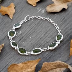 Natural Green Peridot Gemstone Bracelet \ Vintage Bracelet \ Chain Bracelet \ Adjustable Bracelet \ Bracelet For Her \ Minimalist Bracelet Stone Size    : 13 x 11 mm Weight          : 18.26 gm Bangle Size  : 10 inches Color             : Green Material        : Copper Polish            : All Polish Available   . Contact us for wholesale prices. R I N G S https://www.etsy.com/in-en/shop/GemFormingStudio?section_id=22783374 B E A D S https://www.etsy.com/in-en/shop/GemFormingStudio?section_id=22828835 W A N D S https://www.etsy.com/in-en/shop/GemFormingStudio?section_id=22997040 C H A R M S https://www.etsy.com/in-en/shop/GemFormingStudio?section_id=23027116 B A N G E L S https://www.etsy.com/in-en/shop/GemFormingStudio?section_id=22816494 P E N D A N T S https://www.etsy.com/in-en/shop/GemF How To Polish Copper, Bracelet For Her, Bracelet Stone, Bracelets Silver, Bracelet Chain, Peridot Gemstone, Vintage Bracelet, Minimalist Bracelet, Green Peridot