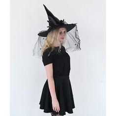 Skeleteen Classic Witch Headpiece is the ideal headwear for any woman dressing up as a cute witch Halloween. This beautiful witch hat can be worn for many style witches, a wicked one, a vintage one, a Victorian one, a creepy one, or a classy one. This hat is made of fancy black fabric, Satin-Feel and has cool decorations on the side that include a black bow with beads, a black veil with spiders hanging down, and some black feather accents. This big felt hat is made to fit most women's heads. Ske Halloween Wide Brim Fitted Mini Hat, Fitted Wide Brim Mini Hat For Halloween, Fitted Witchy Hat For Halloween, Halloween Fitted Wide Brim Costume Hat, Fitted Wide Brim Halloween Costume Hat, Black Witchy Hat For Halloween, Spooky Black Costume Hat, Gothic Hat For Halloween, Gothic Halloween Hat For Alternative Fashion