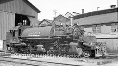 an old black and white photo of a train