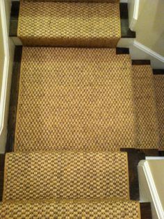 an image of some stairs with carpet on them