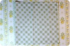 the fabric is green and white checkered with yellow flowers on it's border