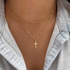 This gold tiny cross necklace is a classic addition to your layering necklaces. This minimalist necklace is also perfect by itself. Timeless and easy. Very simple and perfect for every outfit. ( This listing is just for the cross necklace). . . . . . . . . . . . . . . . . . . . . . . . . . . . . . . . . . . . . . . . . . . Details: ♥ Cross charm: 8x15mm ♥Tarnish resistant ♥ Safe for sensitive skin. All components are 14k gold filled. Delicate, High quality USA components. Comes in a beautiful bo Small Cross Necklace, Tiny Cross Necklace, Dainty Cross Necklace, Cross Jewelry Necklace, Minimalist Necklace Gold, Pretty Jewelry Necklaces, Tiny Cross, Layering Necklaces, Gold Cross Necklace