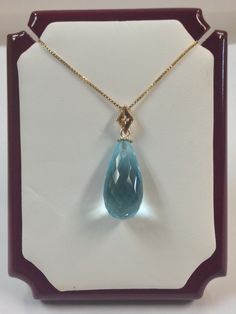 "SOLID 14KT YELLOW GOLD PENDANT NATURAL BLUE TOPAZ IS  20x10 PEAR SHAPE NATURAL DIAMOND IS 0.01 TCW PENDANT IS 1. 1/8\" INCHES ( INCLUDING BAIL ) 925 STERLING SILVER GOLD PLATED CHAIN IS 18\" INCHES (FREE) WITH GIFT BOX" Blue Drop Jewelry With Diamond Accents, Formal Blue Topaz Drop Necklace, Gold Blue Topaz Teardrop Pendant, Fine Jewelry With Faceted Topaz, Blue Topaz Teardrop Necklace For Formal Occasions, Formal Blue Topaz Briolette Necklace, Formal Blue Topaz Teardrop Necklace, Formal Teardrop Blue Topaz Necklace, Fine Jewelry Blue Topaz Briolette Necklace