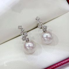 Highline: Elegant Style Product Information OriginJapan MaterialAkoya Pearl, 18k Gold, and Diamond DimensionsEarrings Length Approx. 2.0 cm Pearl Shaped: Round Size: 8-8.5 mm Quality: AAA Nacre: Very Thick Color: White Luster: Aurora Accessories Metal: 18k White Gold Other: 0.45 ct of SI Quality Natural Diamond Luxury Diamond Pearl Earrings For Formal Occasions, Luxury Diamond Pearl Earrings For Formal Events, White Gold Akoya Pearl Diamond Earrings For Formal Events, Formal White Gold Diamond Earrings With Akoya Pearl, Luxury Platinum Pearl Earrings For Wedding, Formal White Gold Akoya Pearl Diamond Earrings, Luxury Pearl Earrings In Diamond White For Formal Occasions, Luxury Diamond White Pearl Earrings For Formal Occasions, Exquisite White Platinum Earrings