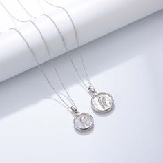 Spiritual Jewelry For Mother's Day, White Spiritual Round Pendant Jewelry, Spiritual White Gold Necklace For Meditation, Spiritual Necklace For Mother's Day Blessing, White Symbolic Necklace For Anniversary, Symbolic White Necklace For Anniversary, White Round Pendant Jewelry For Meditation, Silver Locket Jewelry For Blessing, Spiritual Round Pendant Charm Necklaces For Anniversary