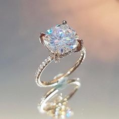 an engagement ring with a diamond in the center