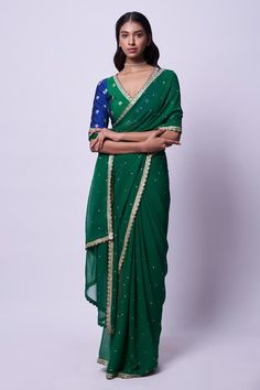 Emerald green silk crepe saree with sequins and zari hand embroidery. Comes with a padded pure raw silk blouse. - Aza Fashions Green Pre-draped Saree With Resham Embroidery In Georgette, Green Pre-draped Saree With Mirror Work For Reception, Green Silk Pre-draped Saree With Gota Work, Green Georgette Saree With Mirror Work, Designer Green Pre-draped Saree With Mirror Work, Green Pre-draped Saree With Gota Work For Eid, Green Pre-draped Saree With Mirror Work For Festivals, Green Chinon Pre-draped Saree For Navratri, Green Bollywood Pre-draped Saree With Gota Work