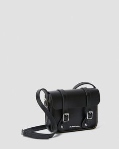 7 Inch Leather Crossbody Bag in Black | Dr. Martens Classic Crossbody Belt Bag, Classic Crossbody Belt Bag For Mobile Phone, Classic Satchel Camera Bag With Adjustable Strap, Travel Crossbody Saddle Bag With Buckle Closure, Travel Saddle Bag With Buckle Closure, Crossbody Style, Classic Crossbody Saddle Bag For School, Classic Belt Bag For Daily Use, Everyday Carry Crossbody Satchel With Adjustable Strap, Everyday Carry Satchel With Mobile Phone Bag