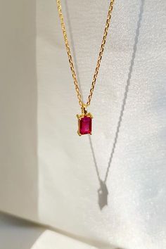 Make a statement with our Ruby Birthstone Necklace, the perfect accessory for any outfit. The ruby gemstone adds a pop of color and sophistication to any look, while the delicate 14k gold-filled chain gives it a touch of elegance. Gift it to your loved ones born in July or to anyone who appreciates a stunning piece of jewelry! 💎 #gemstonejewelry #giftsforher #rubynecklace #goldjewelry #birthdaygift #spring2023 #summerfashion #birthstonejewelry Red Ruby Gemstone Necklace, Red Ruby Gemstone Necklaces, Dainty Red Birthstone Necklace, Dainty Ruby Gemstone Birthstone Necklace, Red Dainty Birthstone Jewelry, Red Ruby Birthstone Necklaces, Red Lab-created Ruby Necklace As Gift, Dainty Red Birthstone Jewelry, Red Lab-created Ruby Necklace Gift