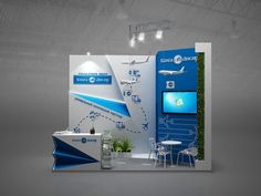 an exhibition stand with a blue and white design