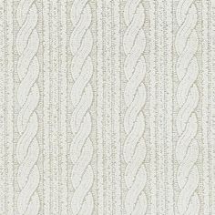 an upholstered wallpaper with white and beige lines on the outside, as well as