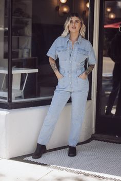 Free People Marci Denim Jumpsuit - Clear Skies-FREE PEOPLE-Jayden P Boutique Utility Denim Jumpsuit With Short Sleeve And Relaxed Fit, Utility Style Denim Jumpsuit With Relaxed Fit, Medium Wash Denim Jumpsuit With Short Sleeve For Work, High Rise Denim Blue Utility Jumpsuit, High Waist Fitted Utility Jumpsuits And Rompers, Medium Wash Relaxed Fit Denim Utility Jumpsuit, Fitted High Waist Utility Jumpsuits And Rompers, Straight Leg Jumpsuits And Rompers For Workwear In Spring, Fitted High Waist Denim Jumpsuit In Utility Style