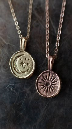 Lume - Unique Hand-Crafted Sun and Moon Necklaces in Recycled Solid Gold | Rhodes Wedding Co. Sun And Moon Necklace Couples, Sun And Moon Matching Necklaces, Celestial Round Pendant Jewelry In Brass, Celestial Jewelry With Sun And Moon Designs, Bohemian Yellow Gold Necklace With Moon Charm, Celestial Sun And Moon Jewelry, Brass Sun And Moon Pendant Jewelry, Sun And Moon Brass Pendant Jewelry, Sun And Moon Design Brass Pendant Jewelry