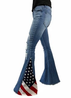 Flag flare denim bell bottom flare jeans are made of 98% cotton and 2% spandex. These are vintage inspired and showy. They are super comfortable and have some stretch to them. The size runs a little on the small side. Model is 5'7" 35-25-38 wearing a size small. Rise: 10” (approx.) Inseam: 33” (approx.) Slight stretch Zip-fly closure Front pockets Back pockets Flared leg Frayed hem Small 0/2/4 waist 25" to 27" Medium 4/6/8 waist 27" to 29" Large 8/10/12 waist 29" to 31" MADE IN THE U.S.A. Our gu Striped Flare Pants, Fringe Pants, Cute Fit, Fit Ideas, Bell Bottom, Denim Flares, Country Outfits, Women Clothing Boutique, Model Hair